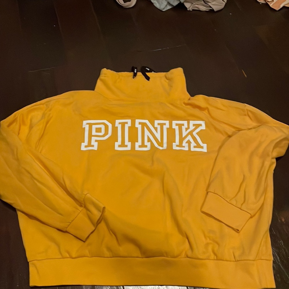 Pink yellow high top crewneck? Idk what to call it lol